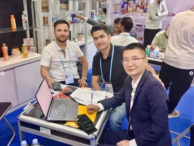 Meeting at an exhibition booth