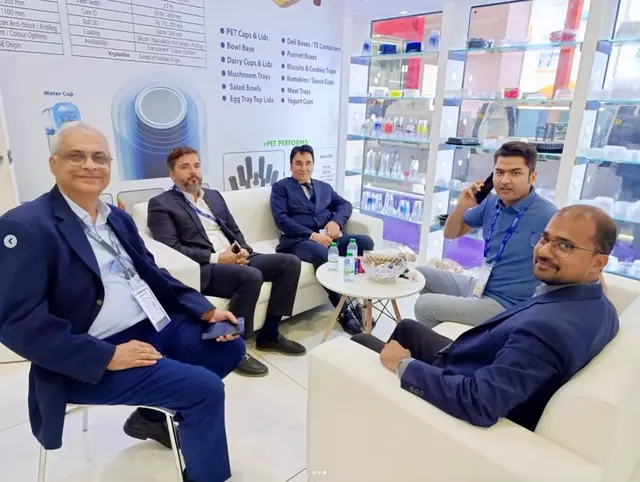 Discussion at a packaging booth